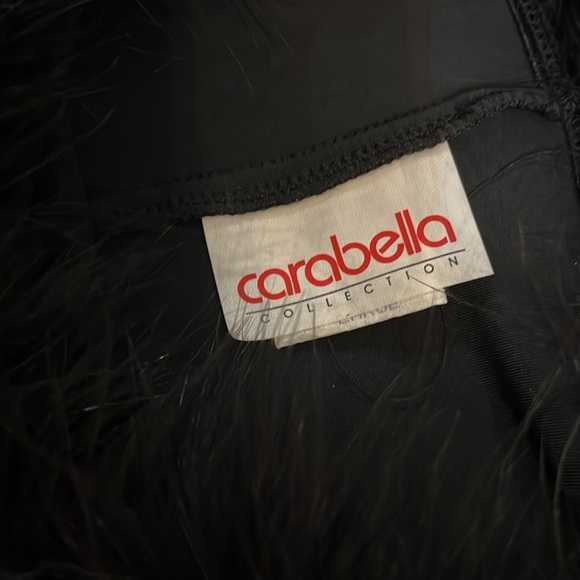 Carabella Black Dress. Scoop neckline trimmed in feathers. Long sleeves feathers - Picture 11 of 12